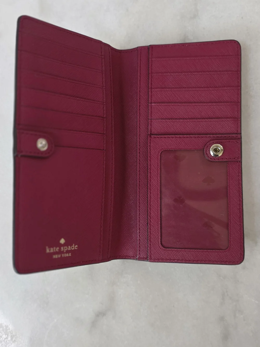 Kate Spade New York Staci Large Slim Bifold Wallet Mint Green Pebbled Leather